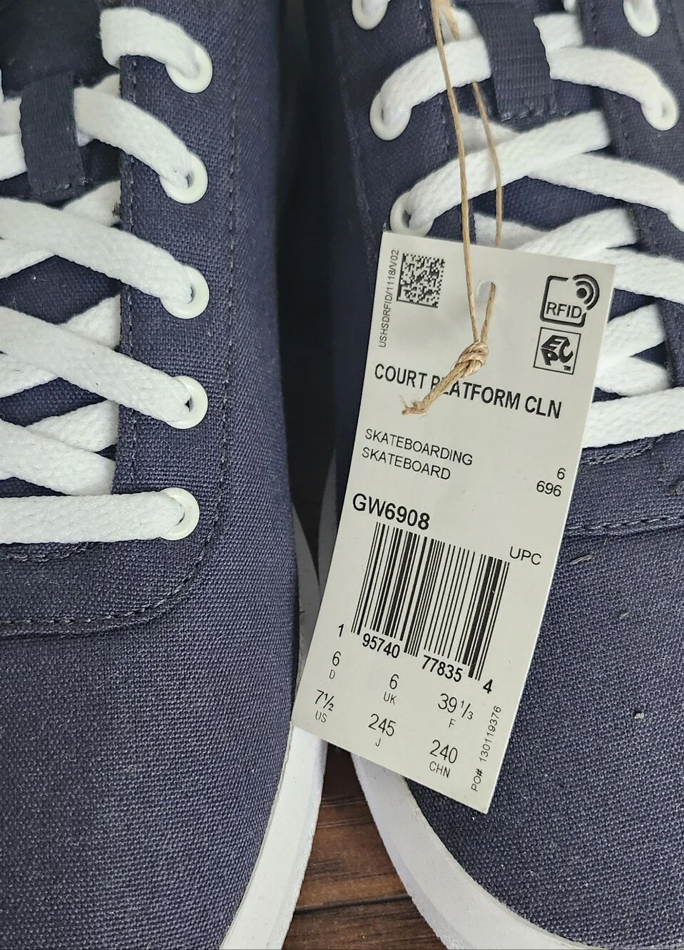 adidas Navy and White Low-Top Sneakers with Red Tab